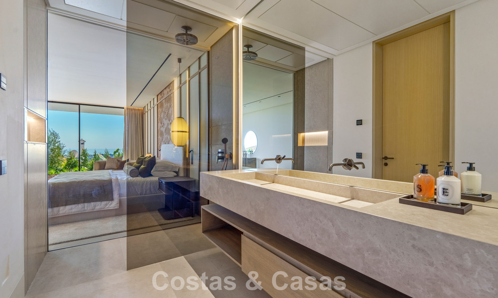 Majestueuze, eigentijdse nieuwbouwvilla te koop met subliem zeezicht in de heuvels van La Quinta te Benahavis - Marbella 786678