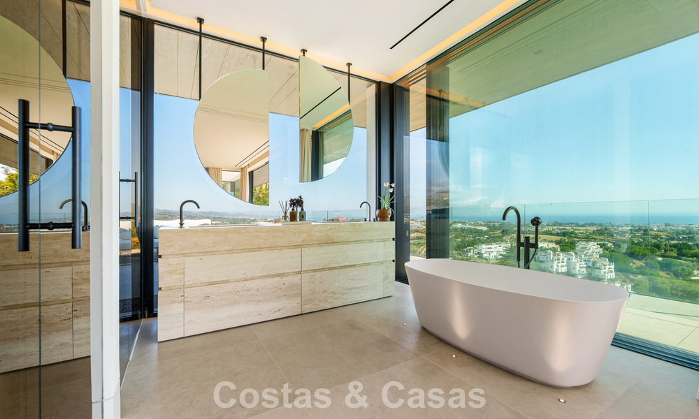 Majestueuze, eigentijdse nieuwbouwvilla te koop met subliem zeezicht in de heuvels van La Quinta te Benahavis - Marbella 786688