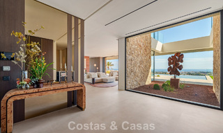 Majestueuze, eigentijdse nieuwbouwvilla te koop met subliem zeezicht in de heuvels van La Quinta te Benahavis - Marbella 786695 