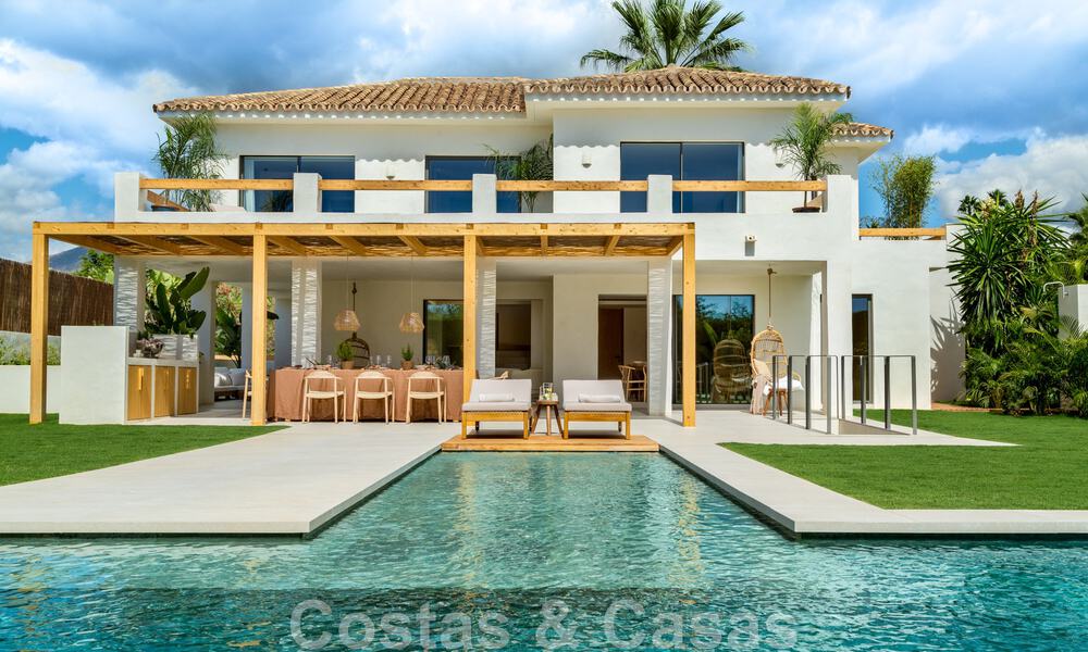 Instapklare, luxueuze designvilla te koop op loopafstand van het voorzieningen in de golfvallei van Nueva Andalucia, Marbella 46686