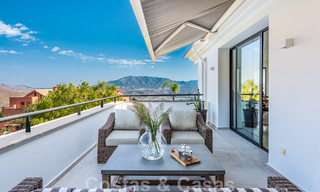 Vrijstaande, Andalusische villa te koop met panoramisch berg- en zeezicht in een exclusieve urbanisatie te Oost Marbella 47348 