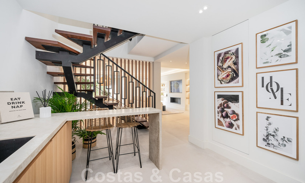 Instapklaar! Eigentijds gerenoveerde rijwoning te koop in een gated community in La Quinta te Benahavis - Marbella 49456