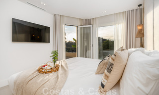 Instapklaar! Eigentijds gerenoveerde rijwoning te koop in een gated community in La Quinta te Benahavis - Marbella 49467 