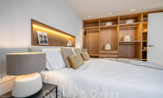 Instapklaar! Eigentijds gerenoveerde rijwoning te koop in een gated community in La Quinta te Benahavis - Marbella 49479 