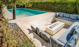 Eigentijdse nieuwbouwvilla te koop met zeezicht, centraal gelegen op loopafstand van het strand op de Golden Mile van Marbella 50093 