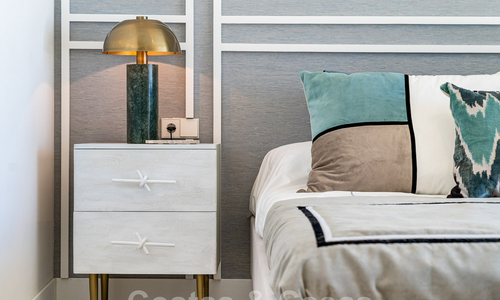 Schitterende show woning te koop in een nieuwbouwproject, bestaande uit halfvrijstaande villa’s met zeezicht in een luxueus resort Mijas, Costa del Sol 48565