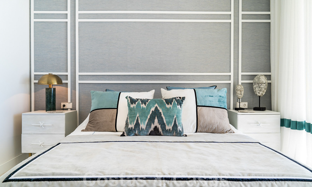 Schitterende show woning te koop in een nieuwbouwproject, bestaande uit halfvrijstaande villa’s met zeezicht in een luxueus resort Mijas, Costa del Sol 48570