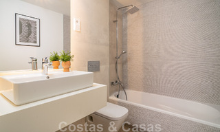 Schitterende show woning te koop in een nieuwbouwproject, bestaande uit halfvrijstaande villa’s met zeezicht in een luxueus resort Mijas, Costa del Sol 48583 