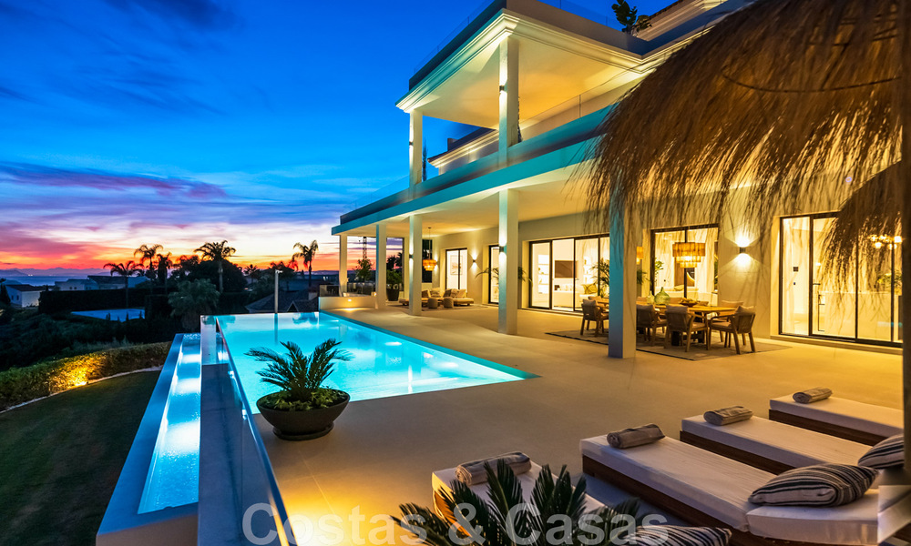 Exclusieve designvilla met panoramisch zeezicht te koop in het een vijfsterren golfresort in Marbella - Benahavis 48822