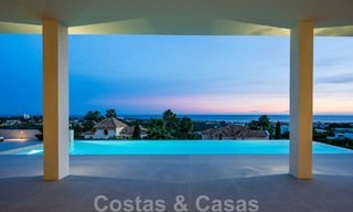 Exclusieve designvilla met panoramisch zeezicht te koop in het een vijfsterren golfresort in Marbella - Benahavis 48823 