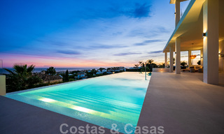 Exclusieve designvilla met panoramisch zeezicht te koop in het een vijfsterren golfresort in Marbella - Benahavis 48824 