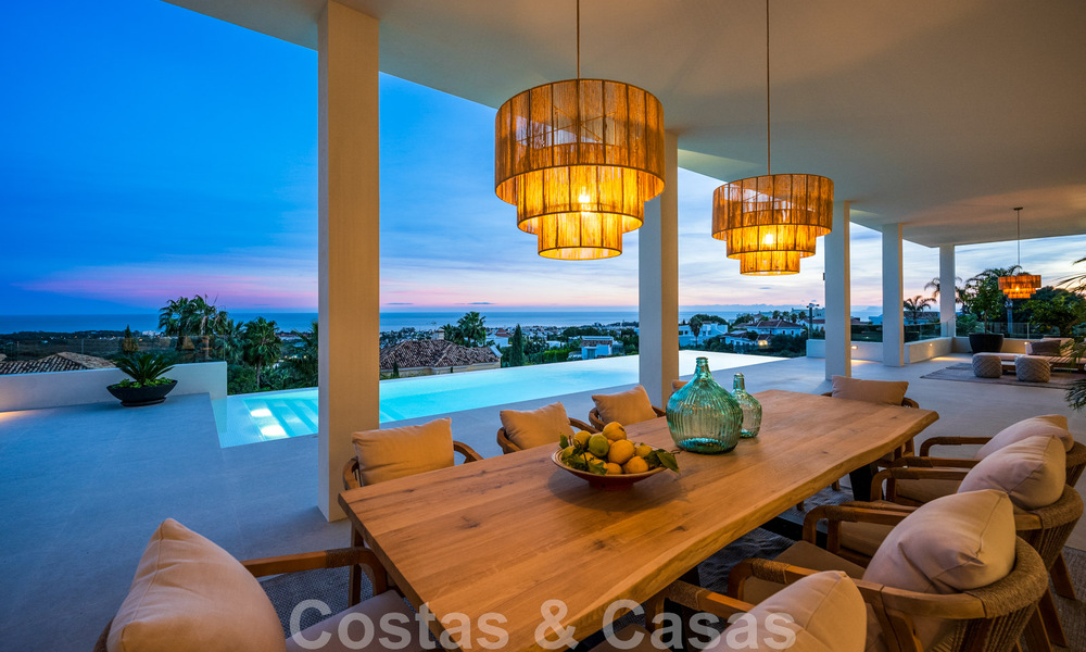 Exclusieve designvilla met panoramisch zeezicht te koop in het een vijfsterren golfresort in Marbella - Benahavis 48827