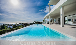 Exclusieve designvilla met panoramisch zeezicht te koop in het een vijfsterren golfresort in Marbella - Benahavis 48832 