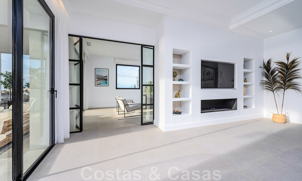 Exclusieve designvilla met panoramisch zeezicht te koop in het een vijfsterren golfresort in Marbella - Benahavis 48836