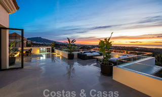Exclusieve designvilla met panoramisch zeezicht te koop in het een vijfsterren golfresort in Marbella - Benahavis 48839 