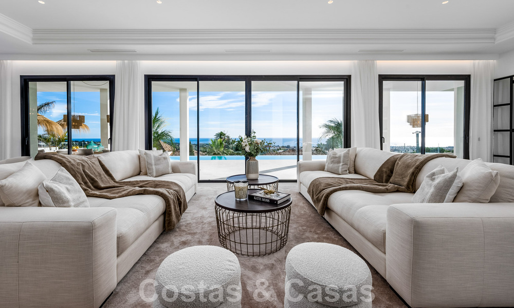 Exclusieve designvilla met panoramisch zeezicht te koop in het een vijfsterren golfresort in Marbella - Benahavis 48849