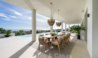 Exclusieve designvilla met panoramisch zeezicht te koop in het een vijfsterren golfresort in Marbella - Benahavis 48851 
