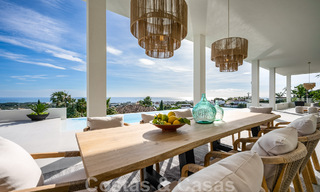 Exclusieve designvilla met panoramisch zeezicht te koop in het een vijfsterren golfresort in Marbella - Benahavis 48852 