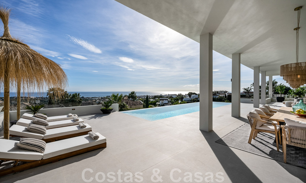 Exclusieve designvilla met panoramisch zeezicht te koop in het een vijfsterren golfresort in Marbella - Benahavis 48853