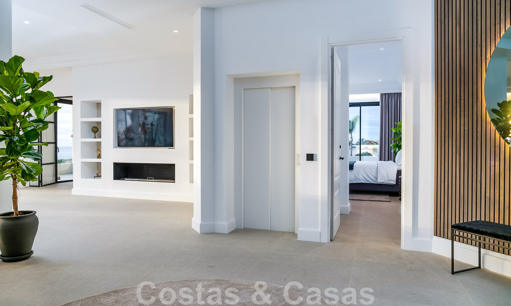 Exclusieve designvilla met panoramisch zeezicht te koop in het een vijfsterren golfresort in Marbella - Benahavis 48859