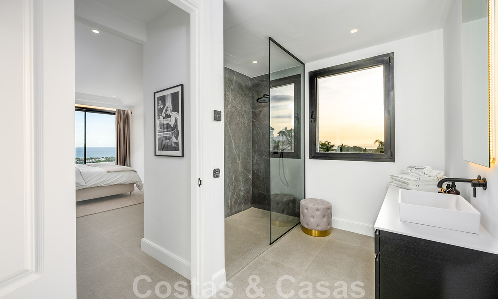Exclusieve designvilla met panoramisch zeezicht te koop in het een vijfsterren golfresort in Marbella - Benahavis 48872