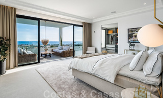 Exclusieve designvilla met panoramisch zeezicht te koop in het een vijfsterren golfresort in Marbella - Benahavis 48882 