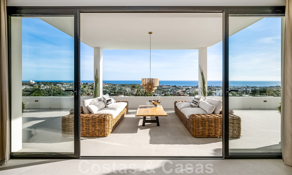 Exclusieve designvilla met panoramisch zeezicht te koop in het een vijfsterren golfresort in Marbella - Benahavis 48887