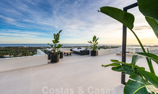 Exclusieve designvilla met panoramisch zeezicht te koop in het een vijfsterren golfresort in Marbella - Benahavis 48893 