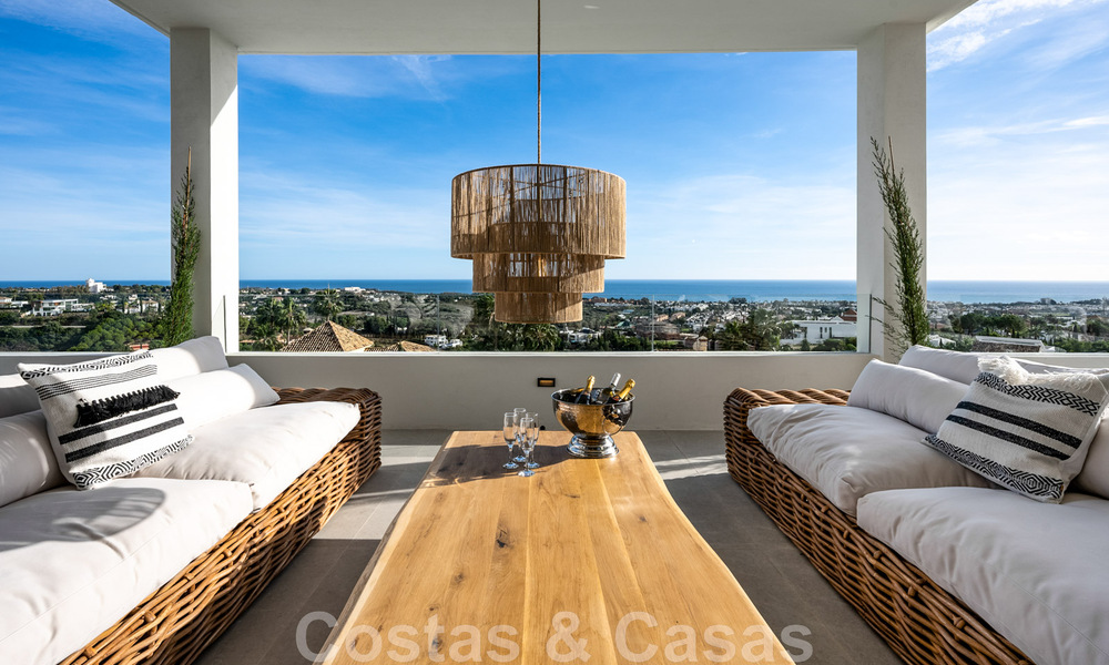 Exclusieve designvilla met panoramisch zeezicht te koop in het een vijfsterren golfresort in Marbella - Benahavis 48897