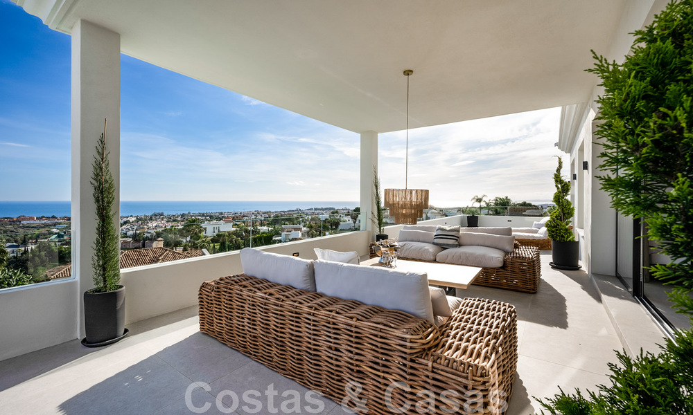 Exclusieve designvilla met panoramisch zeezicht te koop in het een vijfsterren golfresort in Marbella - Benahavis 48899