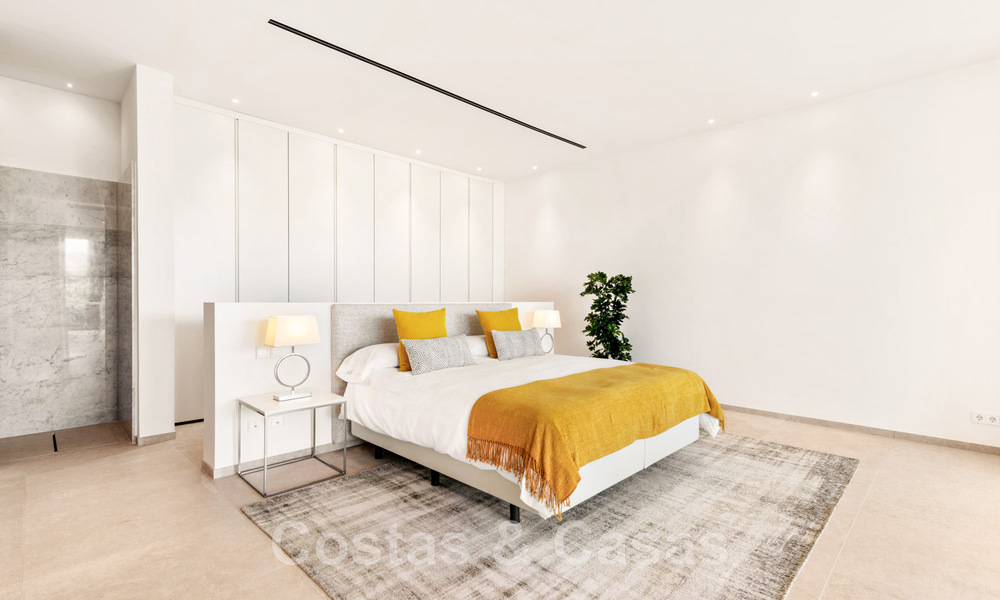 Eerstelijns golf luxevilla in een elegante moderne stijl met prachtig golf- en zeezicht te koop in Los Flamingos Golfresort in Marbella - Benahavis 48935