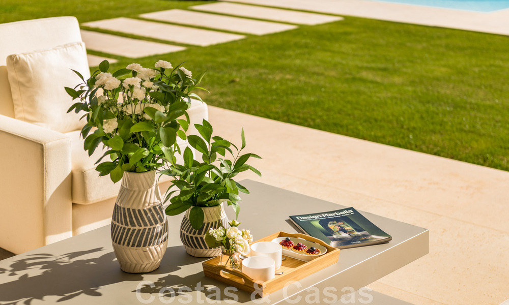 Eerstelijns golf luxevilla in een elegante moderne stijl met prachtig golf- en zeezicht te koop in Los Flamingos Golfresort in Marbella - Benahavis 48948