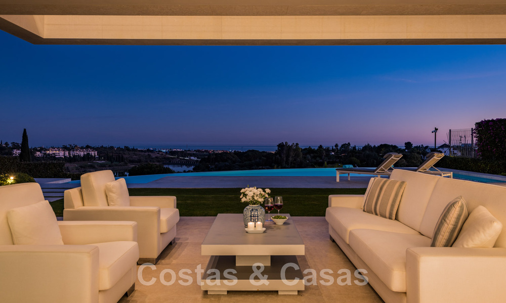 Eerstelijns golf luxevilla in een elegante moderne stijl met prachtig golf- en zeezicht te koop in Los Flamingos Golfresort in Marbella - Benahavis 48961
