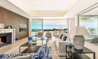 Eerstelijns golf luxevilla in een elegante moderne stijl met prachtig golf- en zeezicht te koop in Los Flamingos Golfresort in Marbella - Benahavis 48969 