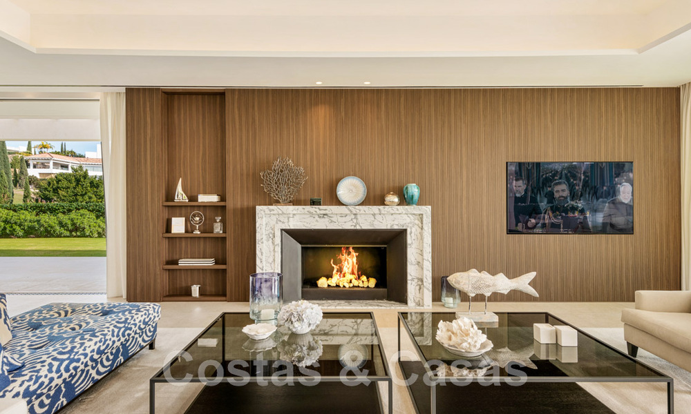 Eerstelijns golf luxevilla in een elegante moderne stijl met prachtig golf- en zeezicht te koop in Los Flamingos Golfresort in Marbella - Benahavis 48973