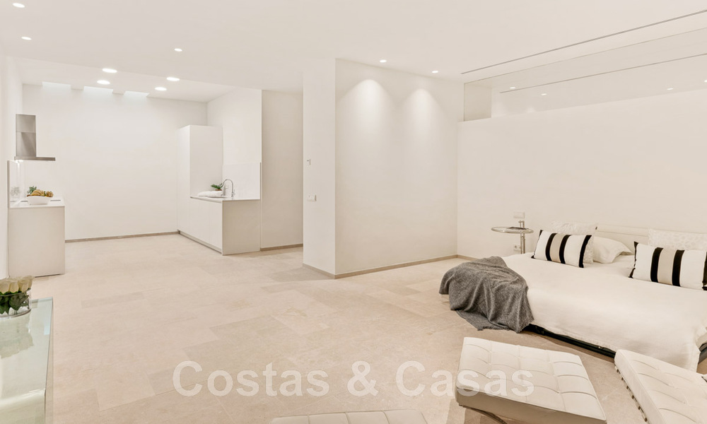 Eerstelijns golf luxevilla in een elegante moderne stijl met prachtig golf- en zeezicht te koop in Los Flamingos Golfresort in Marbella - Benahavis 48985