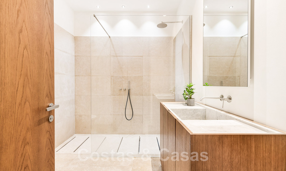 Eerstelijns golf luxevilla in een elegante moderne stijl met prachtig golf- en zeezicht te koop in Los Flamingos Golfresort in Marbella - Benahavis 48996