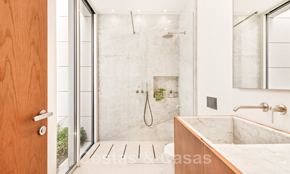 Eerstelijns golf luxevilla in een elegante moderne stijl met prachtig golf- en zeezicht te koop in Los Flamingos Golfresort in Marbella - Benahavis 48997