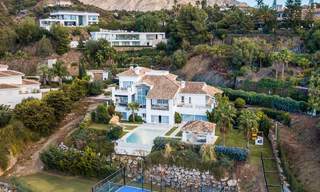 Elegante, Spaanse luxevilla te koop met privé tennisbaan in een afgesloten woonwijk in La Quinta, Benahavis - Marbella 50380 
