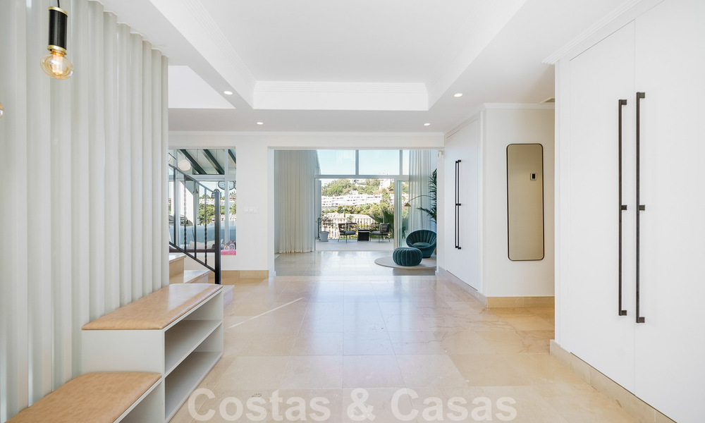 Elegante, Spaanse luxevilla te koop met privé tennisbaan in een afgesloten woonwijk in La Quinta, Benahavis - Marbella 50388
