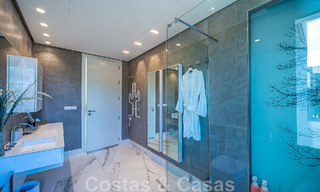 Sfeervolle luxevilla in contemporaine bouwstijl te koop met zeezicht, gelegen in een begeerde residentiële woonwijk op Marbella’s Golden Mile 50169 