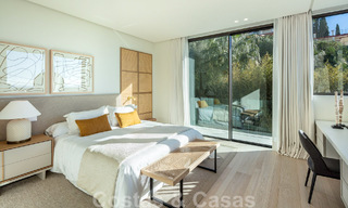 Instapklare, architectonische designervilla te koop met open zeezicht in een prestigieuze gated woonwijk in de heuvels van La Quinta in Benahavis - Marbella 49266 