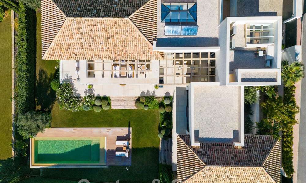 Vrijstaande, Mediterrane luxevilla te koop met verwarmd zwembad en zeezicht, omgeven door golfbanen in Nueva Andalucia, Marbella 50712