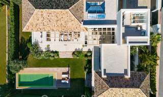 Vrijstaande, Mediterrane luxevilla te koop met verwarmd zwembad en zeezicht, omgeven door golfbanen in Nueva Andalucia, Marbella 50712 