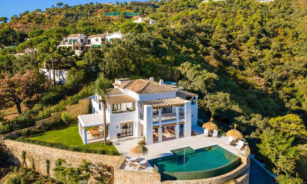 Sublieme Mediterrane luxevilla met gastenverblijf en prachtig zeezicht te koop in El Madroñal, Marbella - Benahavis 51545