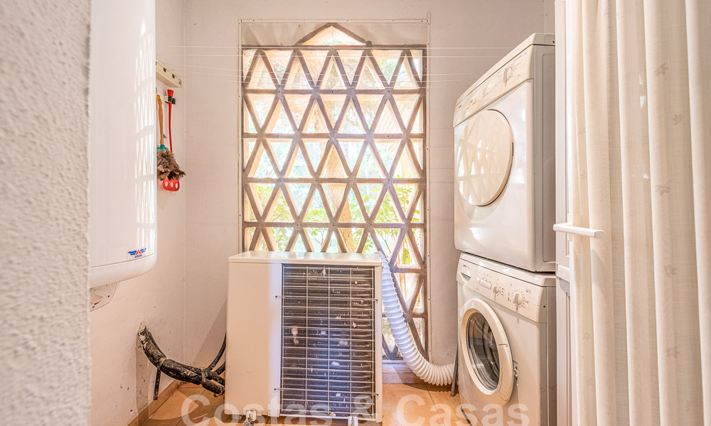 Tuinappartement te koop op loopafstand van Puerto Banus en het strand in een besloten urbanisatie in Nueva Andalucia, Marbella 55195