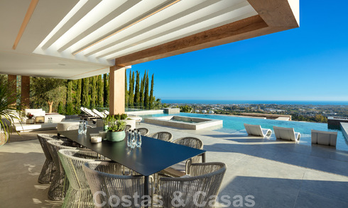Instapklare. Exclusieve, nieuwe villa met onbelemmerd zeezicht te koop, gelegen in een beveiligde wijk in La Quinta, Marbella - Benahavis 51837