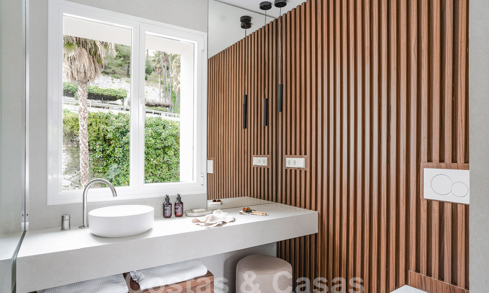 Kwalitatief gerenoveerd appartement te koop met uitzicht op de golfbanen van La Quinta te Benahavis - Marbella 54364