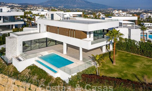 Modernistische luxevilla te koop met magnifiek uitzicht op zee en op de golfbaan in Benahavis - Marbella 54469