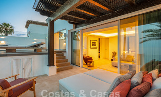 Superieur eerstelijnsstrand penthouse te koop met frontaal zeezicht in Puente Romano op de Golden Mile van Marbella 52907 